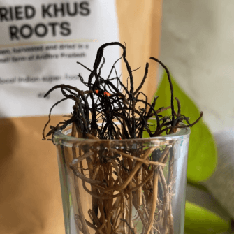Burning of khus roots for positivity