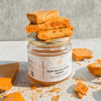 Honeycomb candy and a jar of wildflower honey
